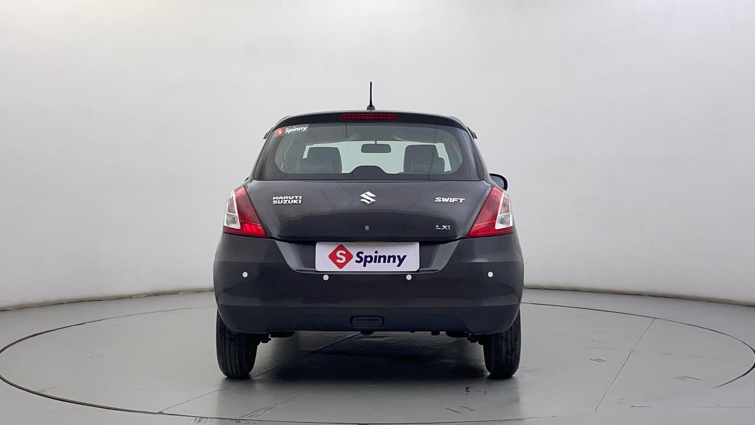 Used 2016 Maruti Suzuki Swift Lxi (O) Petrol Manual exterior BACK VIEW