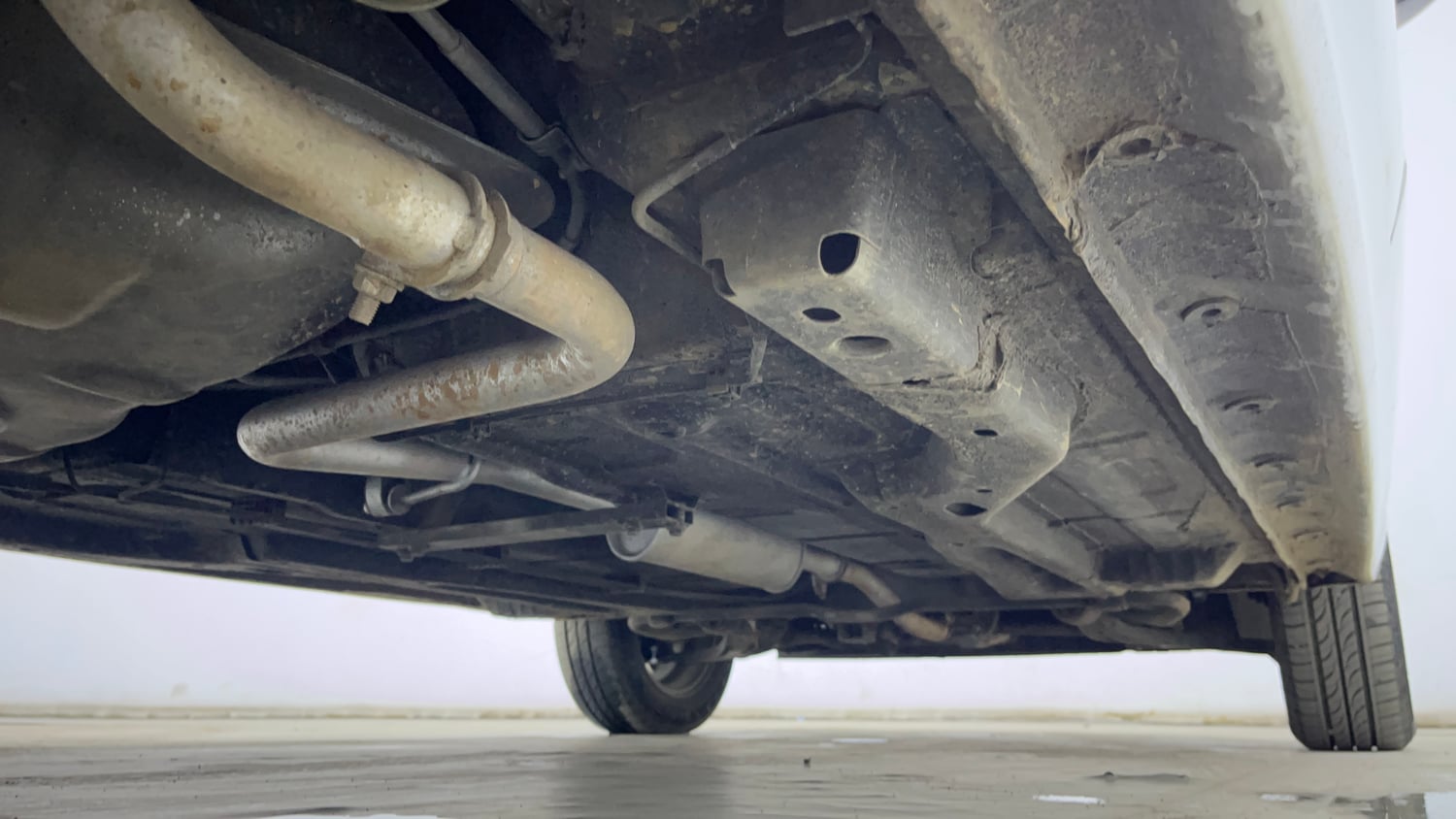 Used 2018 Tata Tiago Revotron XZ Petrol Manual extra REAR RIGHT UNDERBODY VIEW