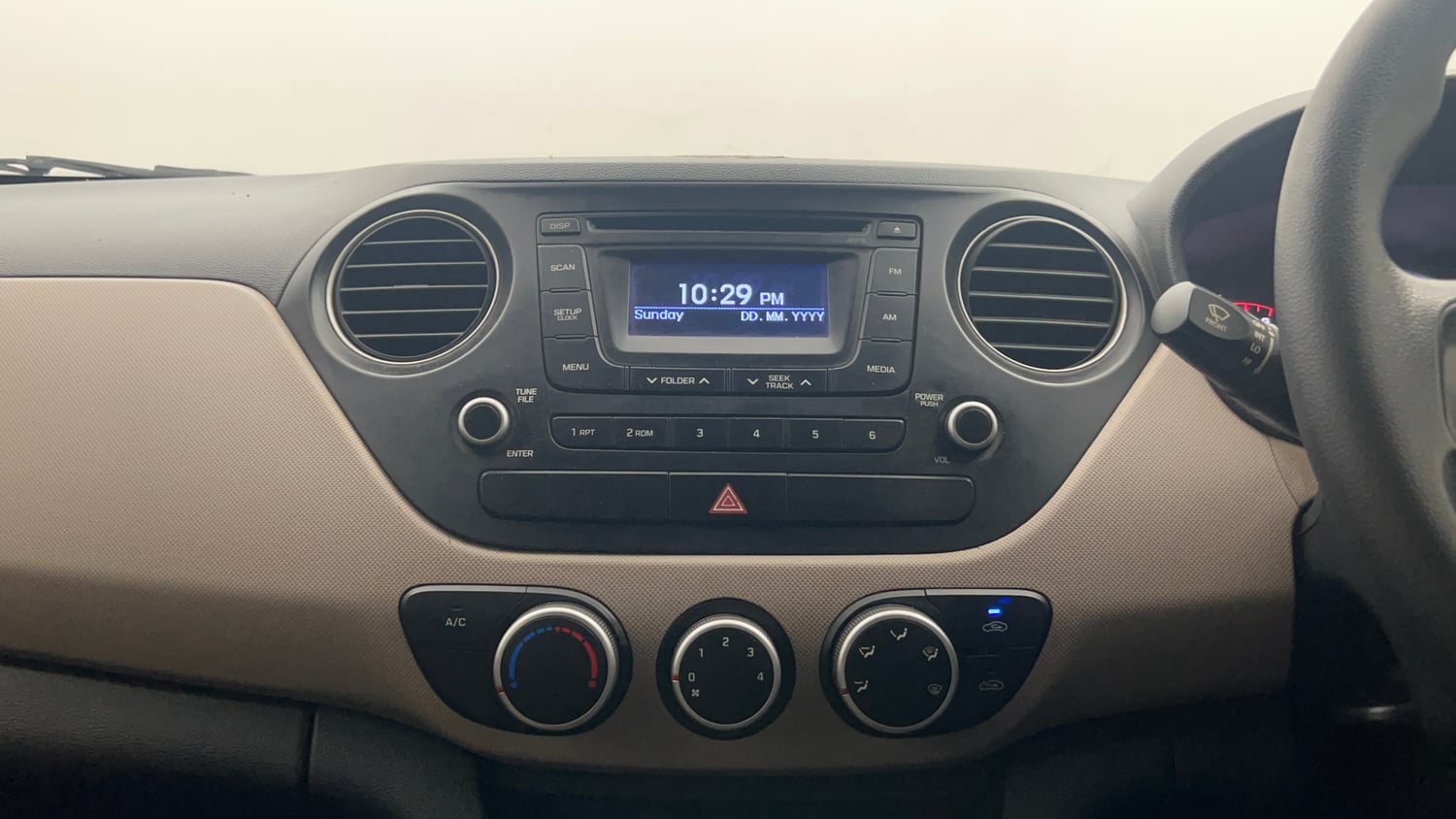 Used 2014 Hyundai Grand i10 Sportz 1.2 Kappa VTVT Petrol Manual interior MUSIC SYSTEM & AC CONTROL VIEW
