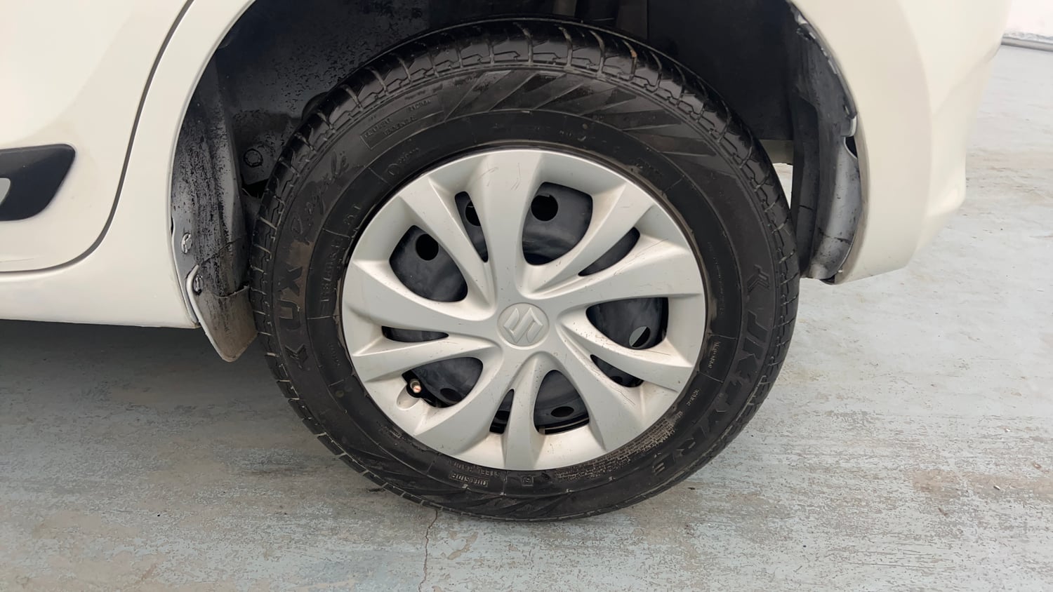 Used 2023 Maruti Suzuki Swift VXi Petrol Manual tyres LEFT REAR TYRE RIM VIEW