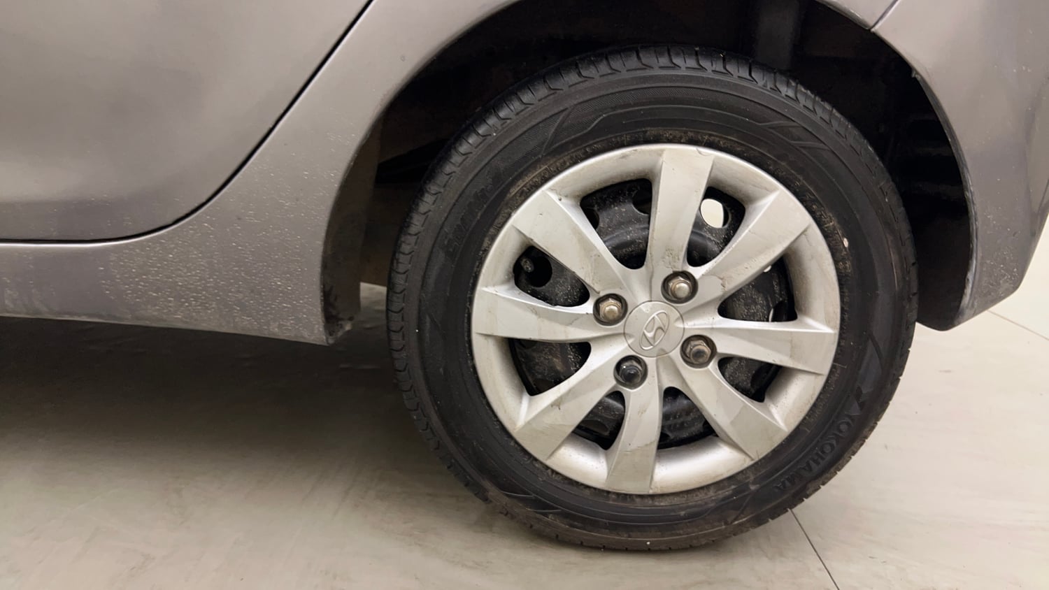 Used 2012 Hyundai Eon Magna + Petrol Manual tyres LEFT REAR TYRE RIM VIEW