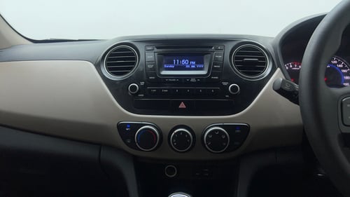 Used 2016 Hyundai Grand i10 Sportz 1.2 Kappa VTVT Petrol Manual interior MUSIC SYSTEM & AC CONTROL VIEW