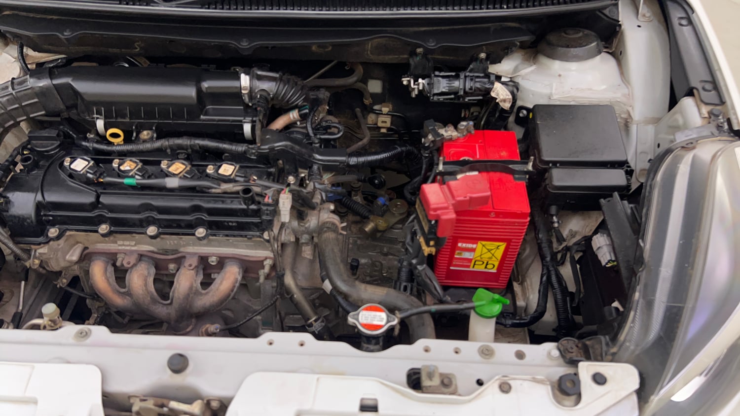 Used 2021 Maruti Suzuki Baleno Delta Petrol Manual engine ENGINE LEFT SIDE VIEW