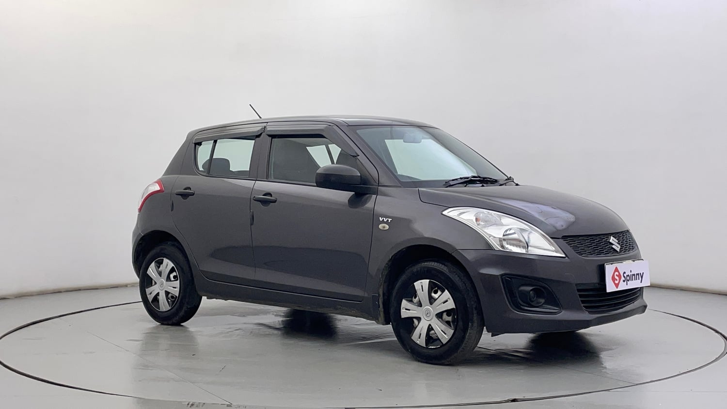Used 2016 Maruti Suzuki Swift Lxi (O) Petrol Manual exterior RIGHT FRONT CORNER VIEW