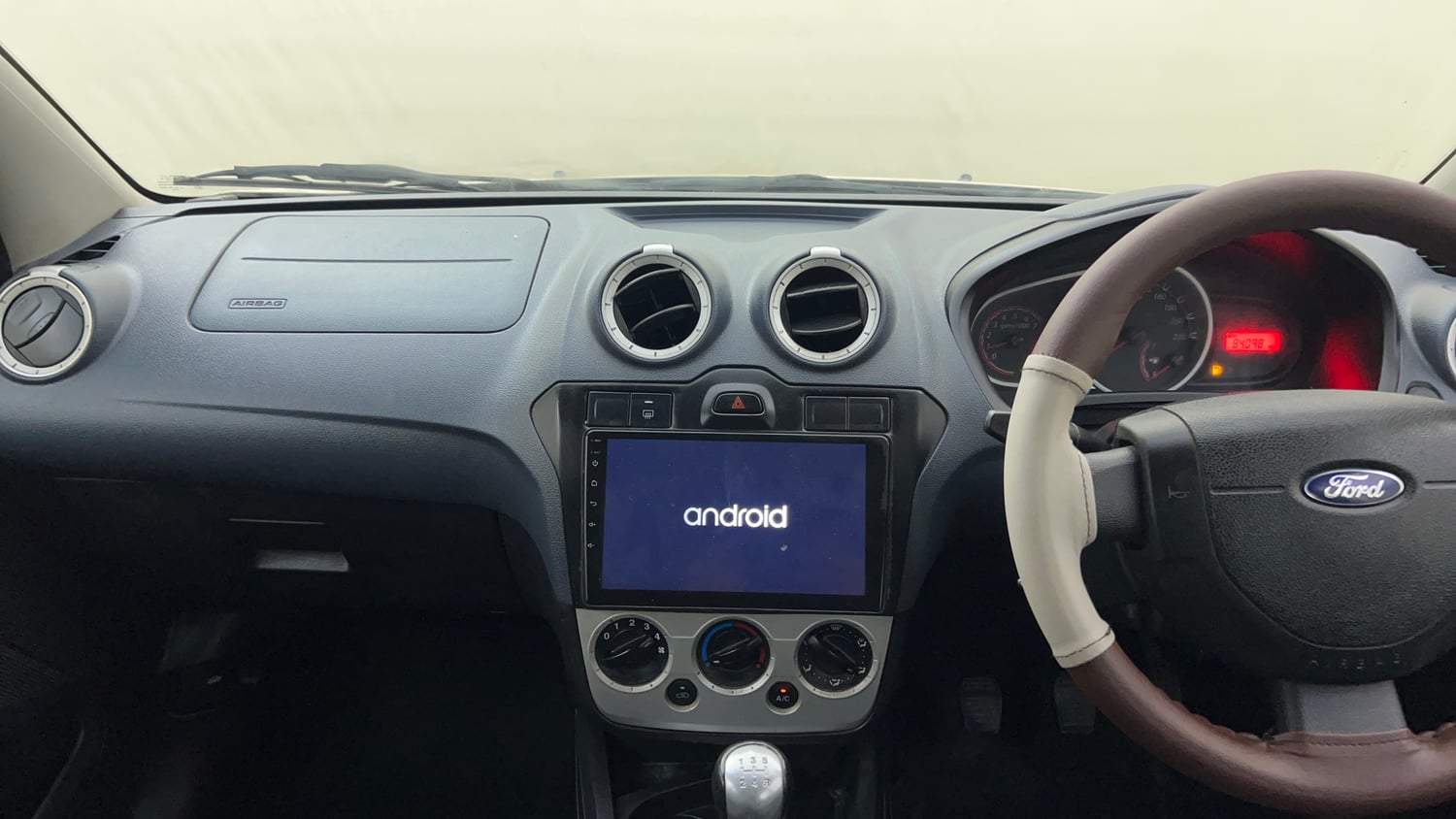 Used 2013 Ford Figo Duratec Petrol Titanium 1.2 Petrol Manual interior MUSIC SYSTEM & AC CONTROL VIEW