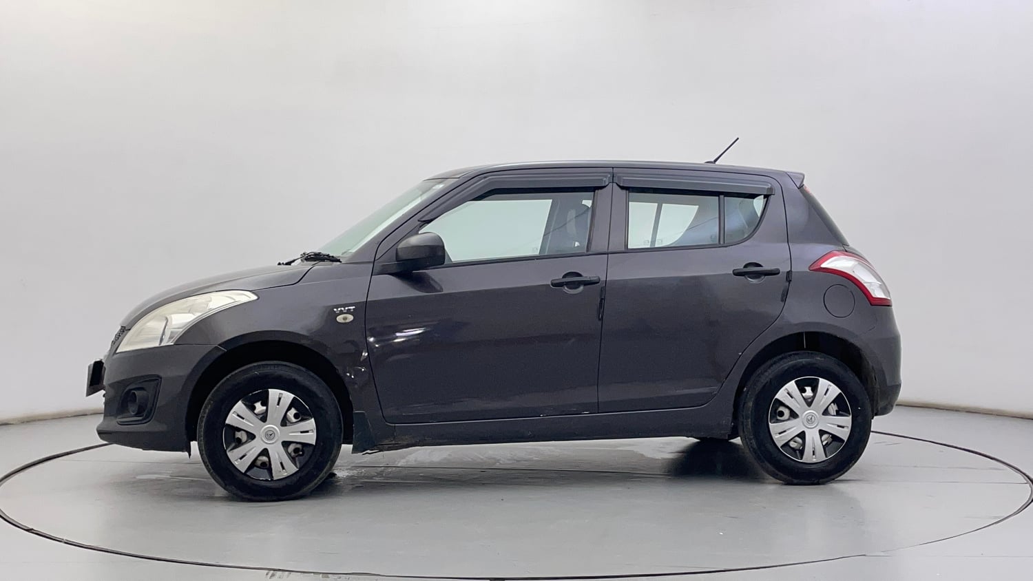 Used 2016 Maruti Suzuki Swift Lxi (O) Petrol Manual exterior LEFT SIDE VIEW