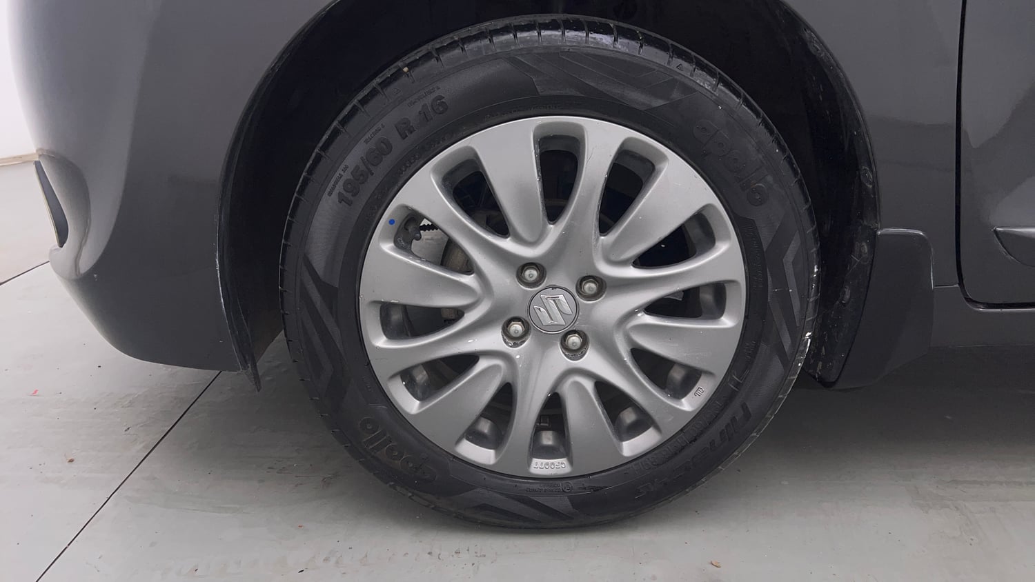 Used 2016 Maruti Suzuki Baleno Alpha 1.2 Petrol Manual tyres LEFT FRONT TYRE RIM VIEW