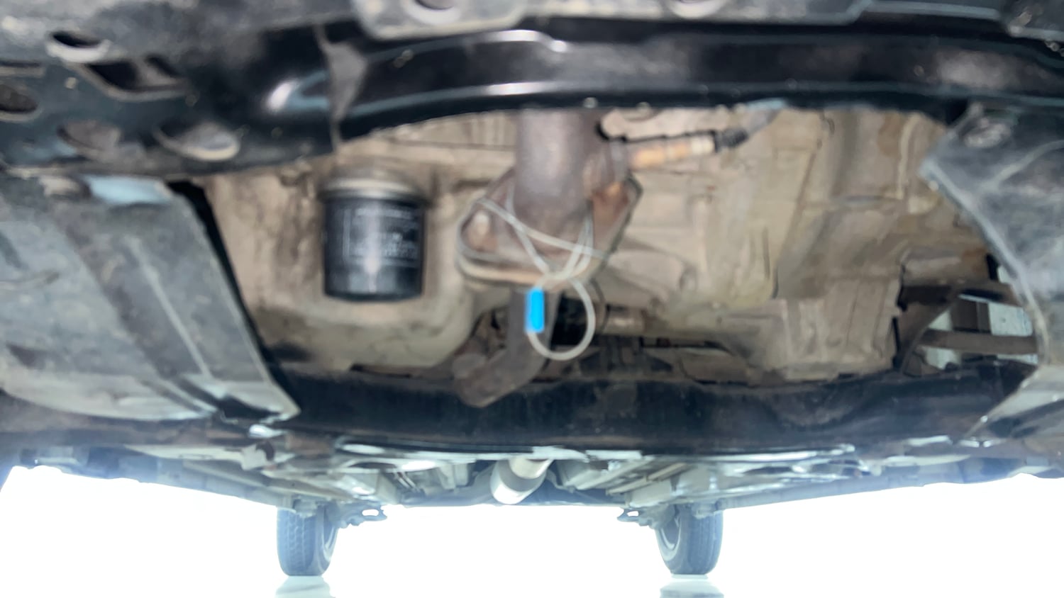 Used 2015 Maruti Suzuki Swift LXi Petrol Manual extra FRONT LEFT UNDERBODY VIEW