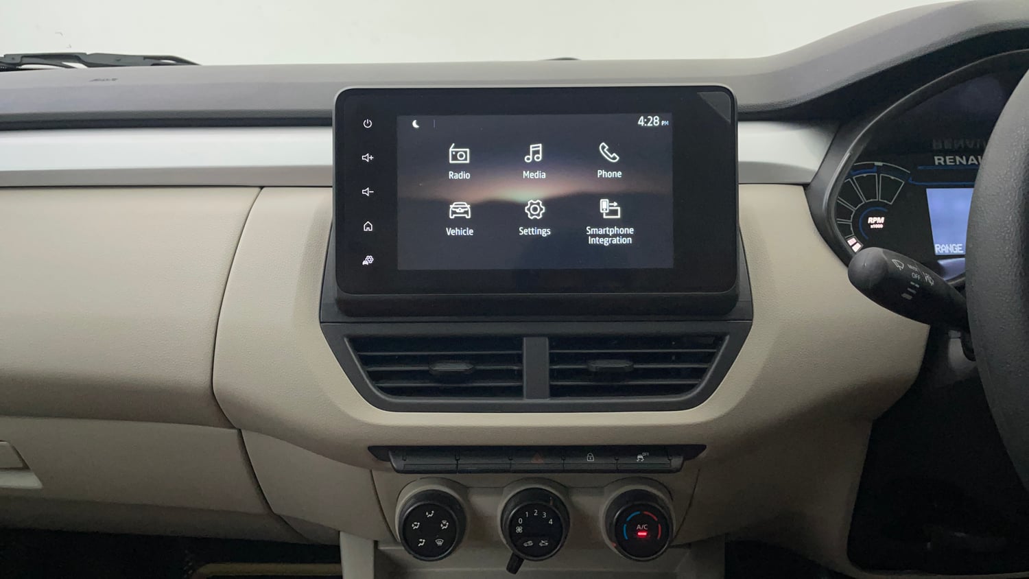 Used 2026 Renault Triber Evolution Petrol Manual interior MUSIC SYSTEM & AC CONTROL VIEW