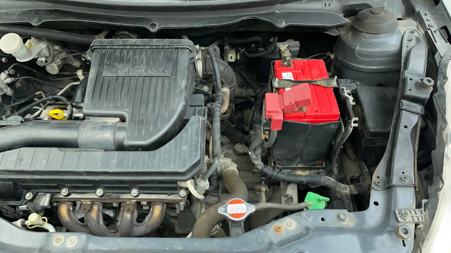 Used 2016 Maruti Suzuki Swift Lxi (O) Petrol Manual engine ENGINE LEFT SIDE VIEW