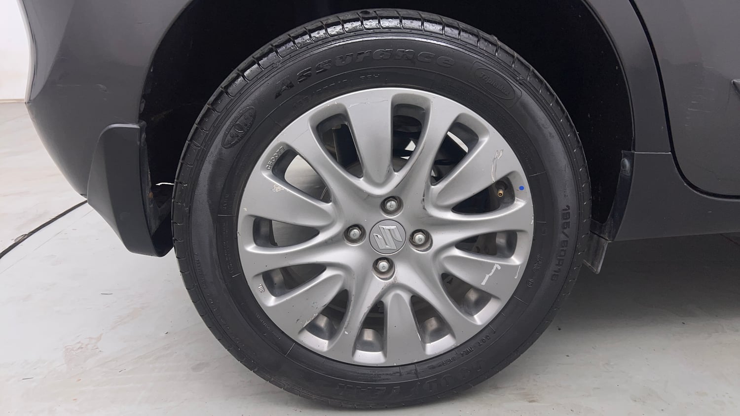 Used 2016 Maruti Suzuki Baleno Alpha 1.2 Petrol Manual tyres RIGHT REAR TYRE RIM VIEW