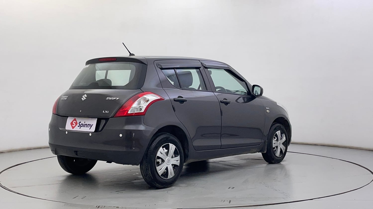 Used 2016 Maruti Suzuki Swift Lxi (O) Petrol Manual exterior RIGHT REAR CORNER VIEW