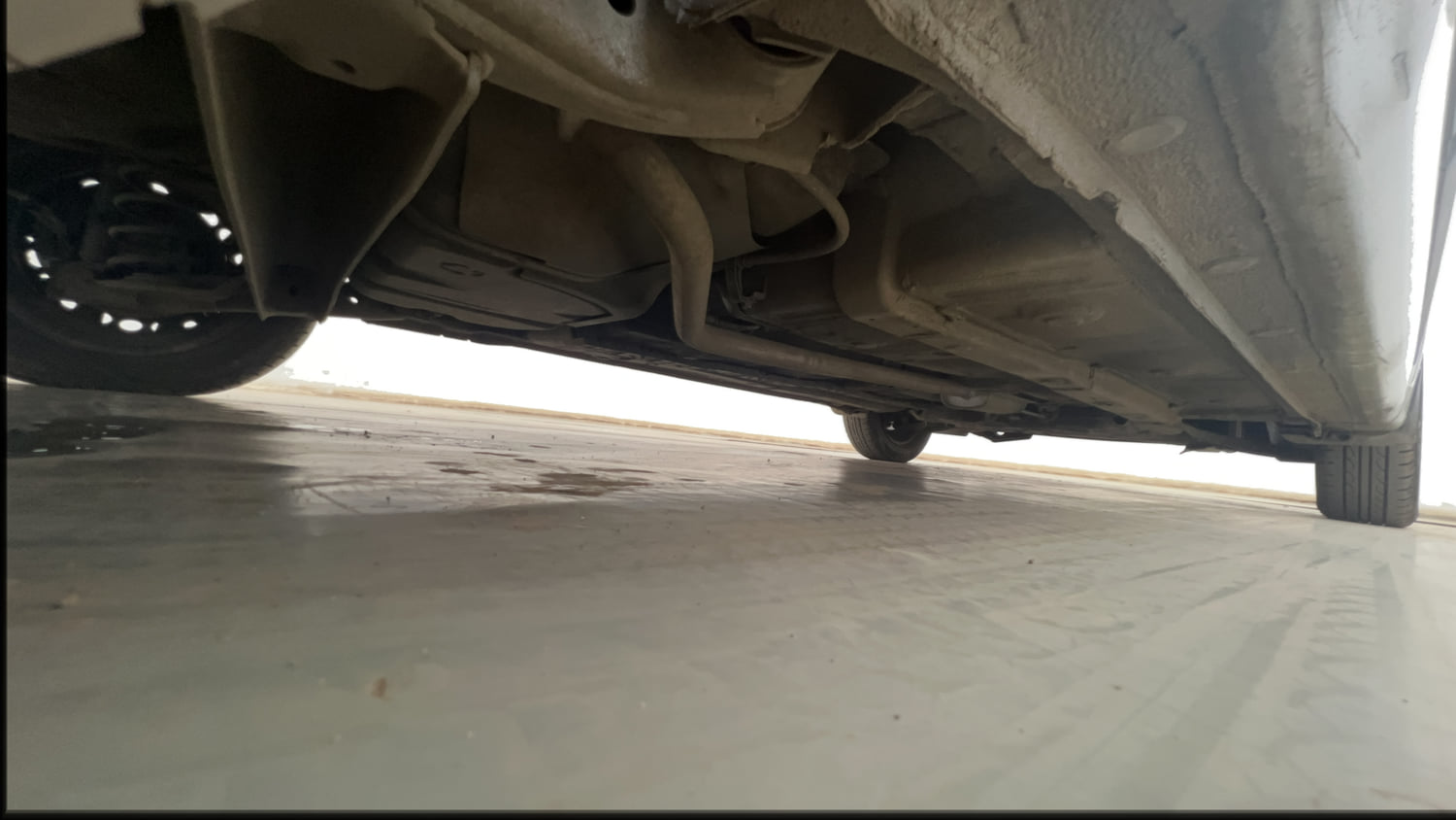 Used 2014 Hyundai Grand i10 Sportz 1.2 Kappa VTVT Petrol Manual extra REAR RIGHT UNDERBODY VIEW