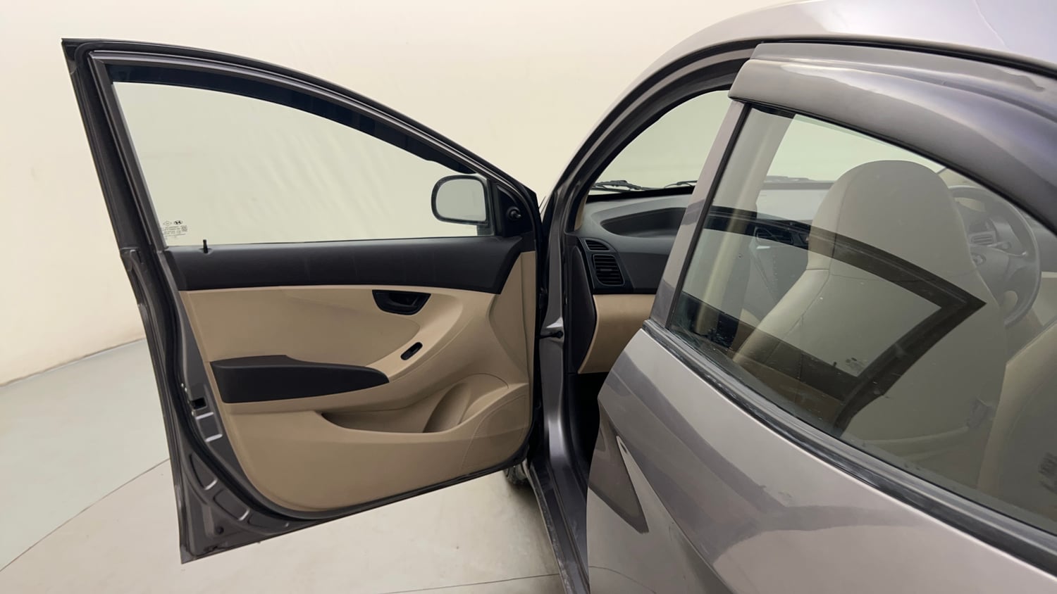 Used 2012 Hyundai Eon Magna + Petrol Manual interior LEFT FRONT DOOR OPEN VIEW