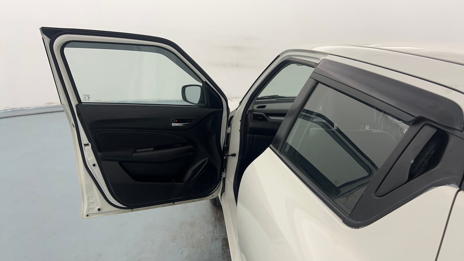 Used 2023 Maruti Suzuki Swift VXi Petrol Manual interior LEFT FRONT DOOR OPEN VIEW
