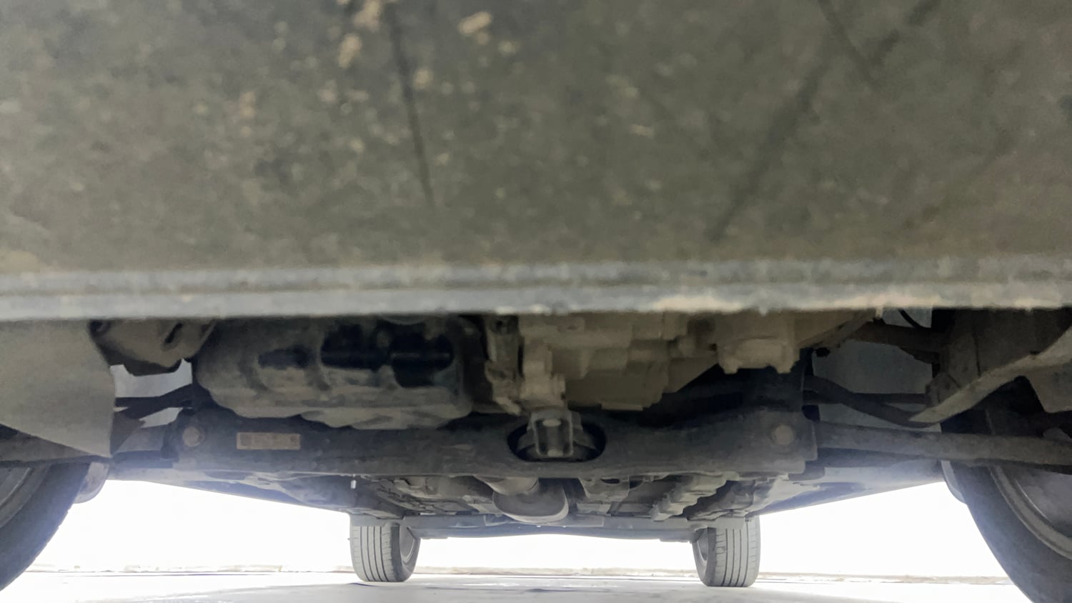 Used 2023 Skoda Slavia Ambition 1.0L TSI MT Petrol Manual extra FRONT LEFT UNDERBODY VIEW
