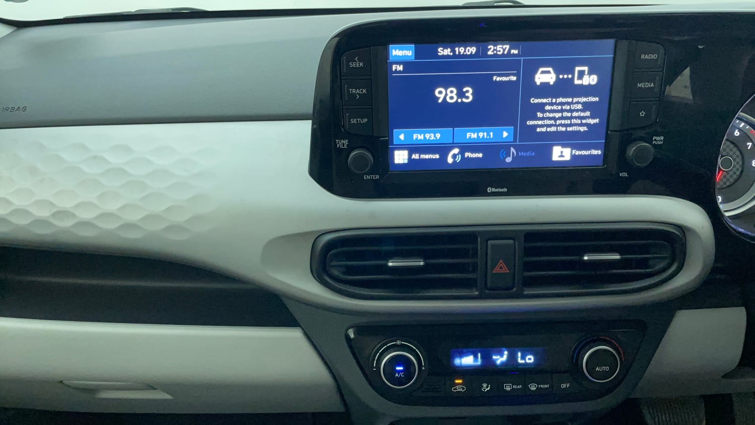 Used 2021 Hyundai Grand i10 Nios Sportz AMT 1.2 Kappa VTVT Petrol Automatic interior MUSIC SYSTEM & AC CONTROL VIEW