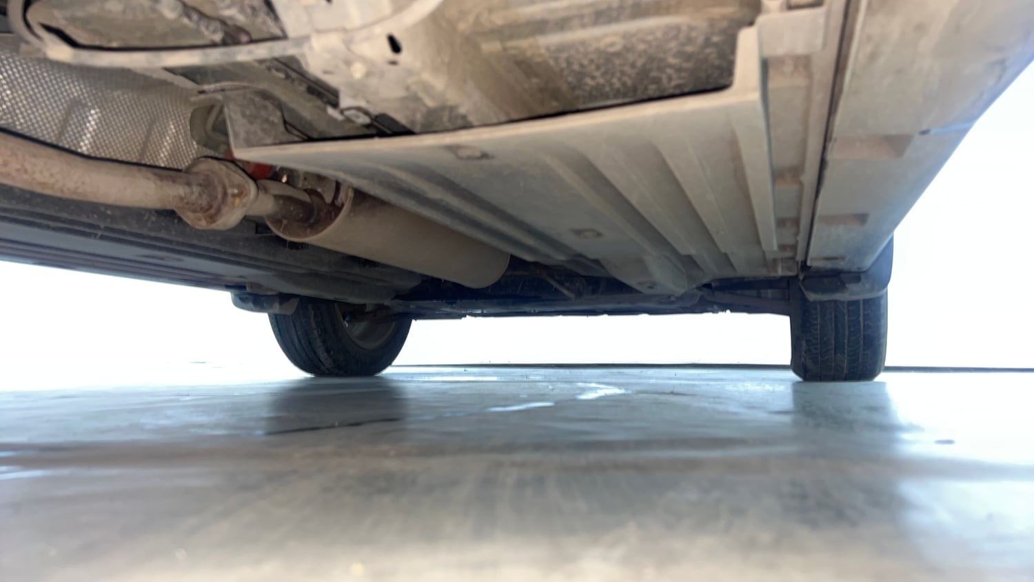 Used 2024 Maruti Suzuki Grand Vitara Alpha Smart Hybrid AT Petrol Automatic extra REAR RIGHT UNDERBODY VIEW