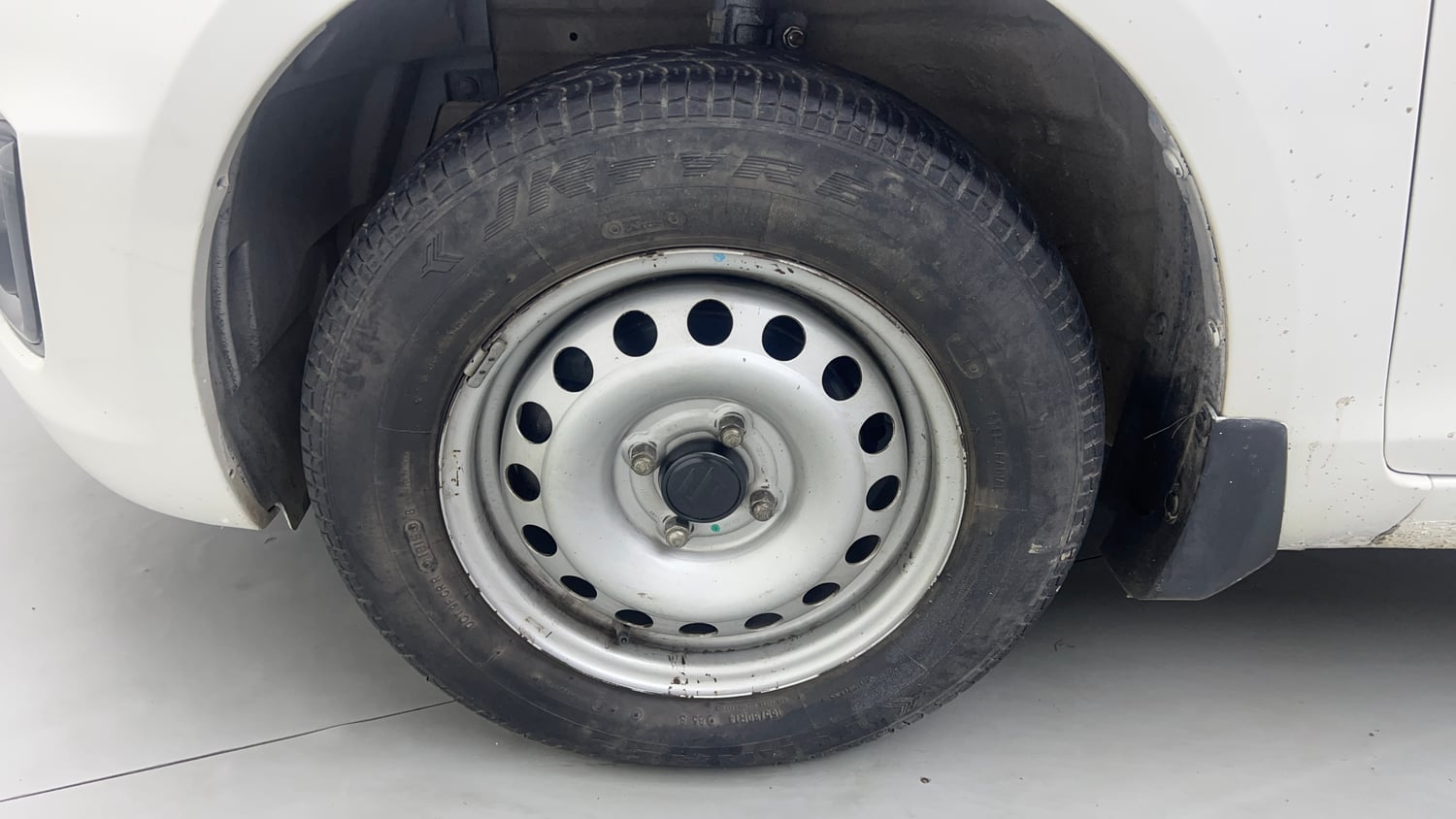 Used 2015 Maruti Suzuki Swift LXi Petrol Manual tyres LEFT FRONT TYRE RIM VIEW