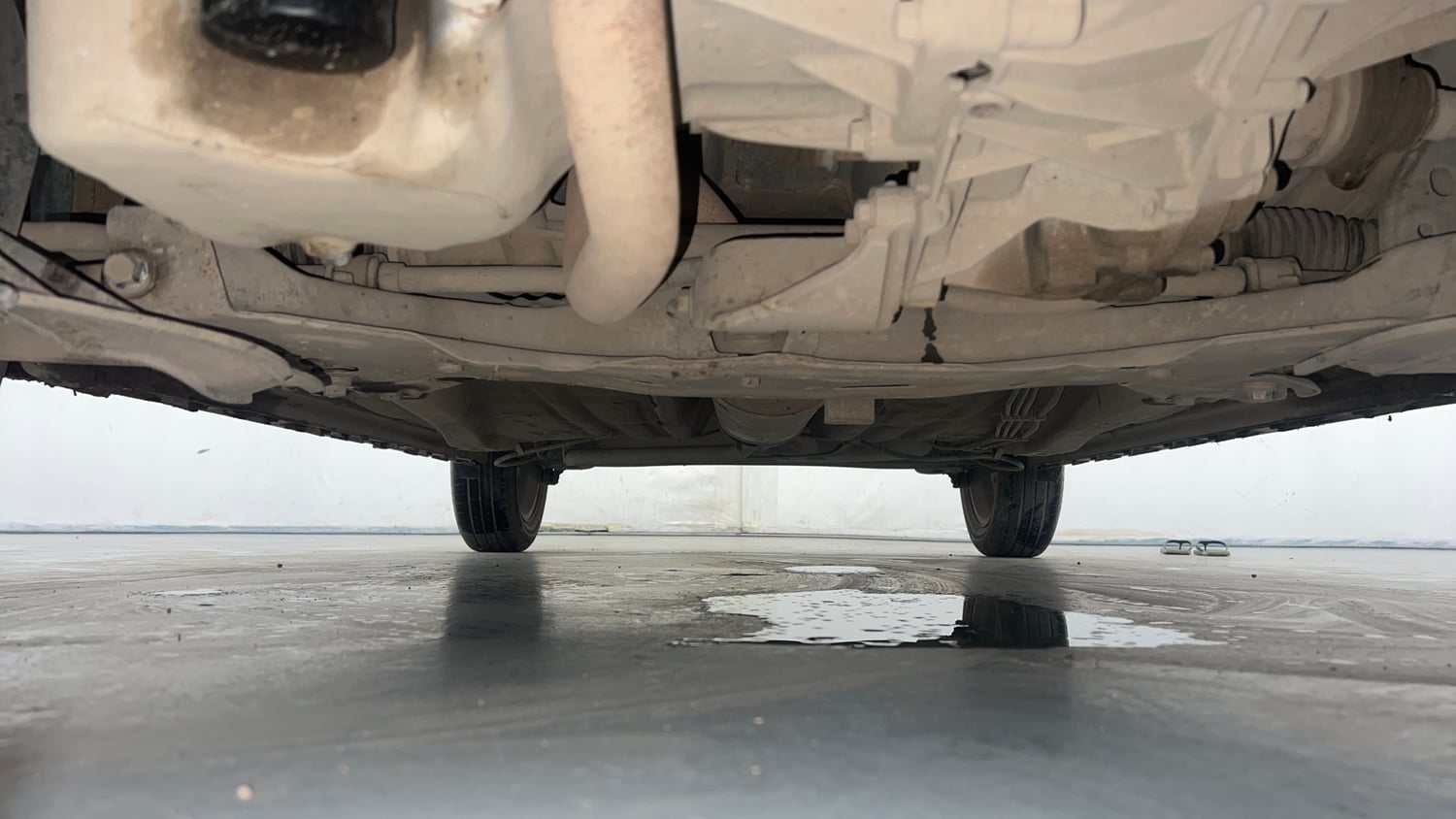 Used 2024 Maruti Suzuki Ignis Zeta 1.2 AMT Petrol Automatic extra FRONT LEFT UNDERBODY VIEW