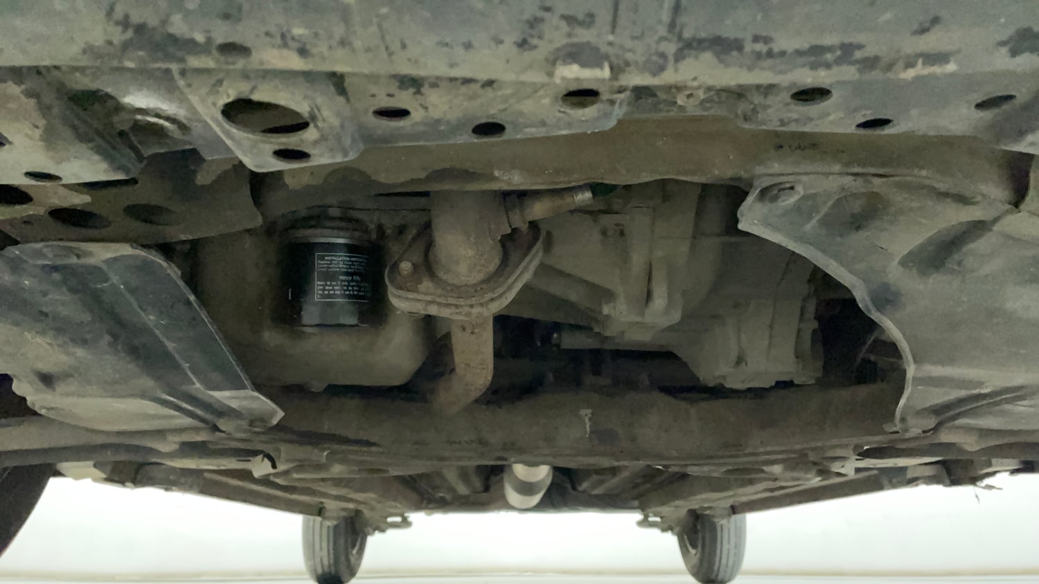 Used 2016 Maruti Suzuki Swift Lxi (O) Petrol Manual extra FRONT LEFT UNDERBODY VIEW