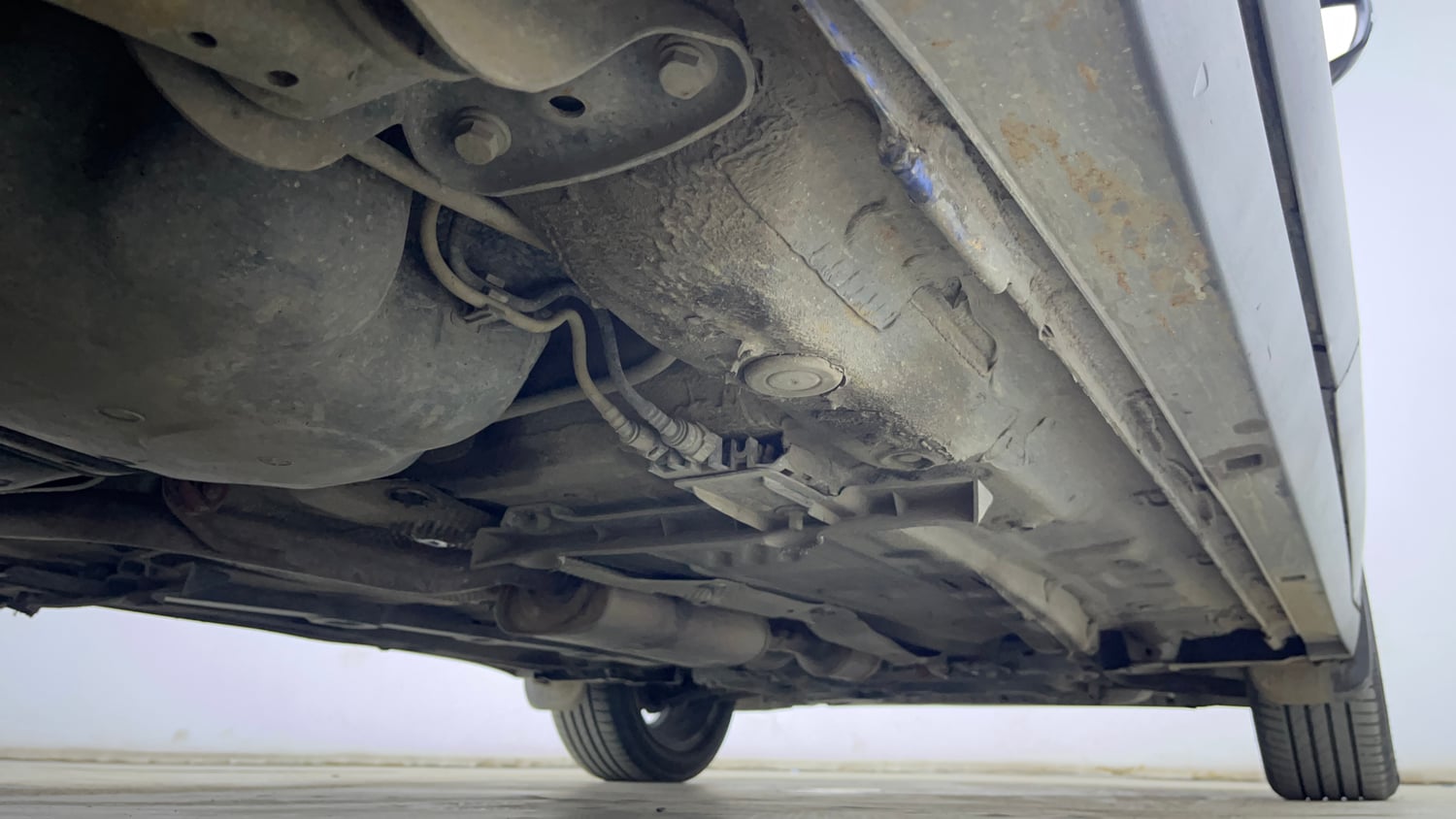 Used 2024 Volkswagen Taigun Topline 1.0 TSI AT Petrol Automatic extra REAR RIGHT UNDERBODY VIEW