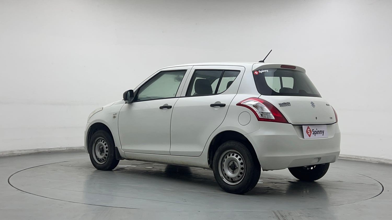 Used 2015 Maruti Suzuki Swift LXi Petrol Manual exterior LEFT REAR CORNER VIEW