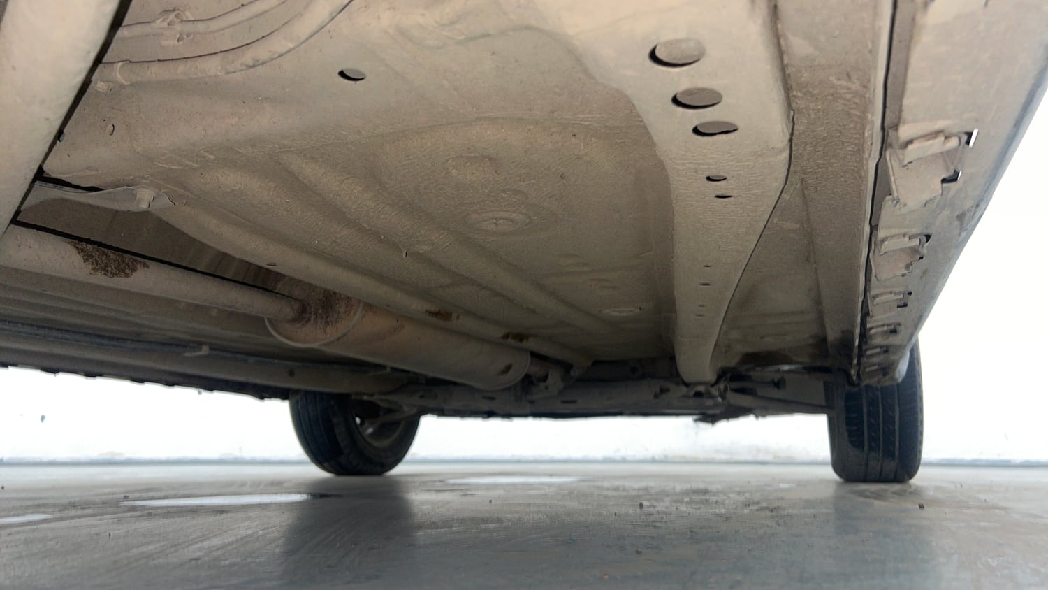 Used 2024 Maruti Suzuki Ignis Zeta 1.2 AMT Petrol Automatic extra REAR RIGHT UNDERBODY VIEW