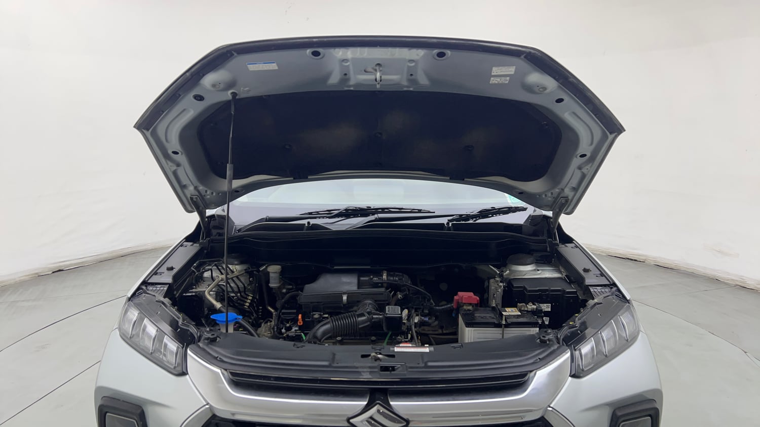 Used 2024 Maruti Suzuki Grand Vitara Delta Smart Hybrid Petrol Manual engine ENGINE & BONNET OPEN FRONT VIEW