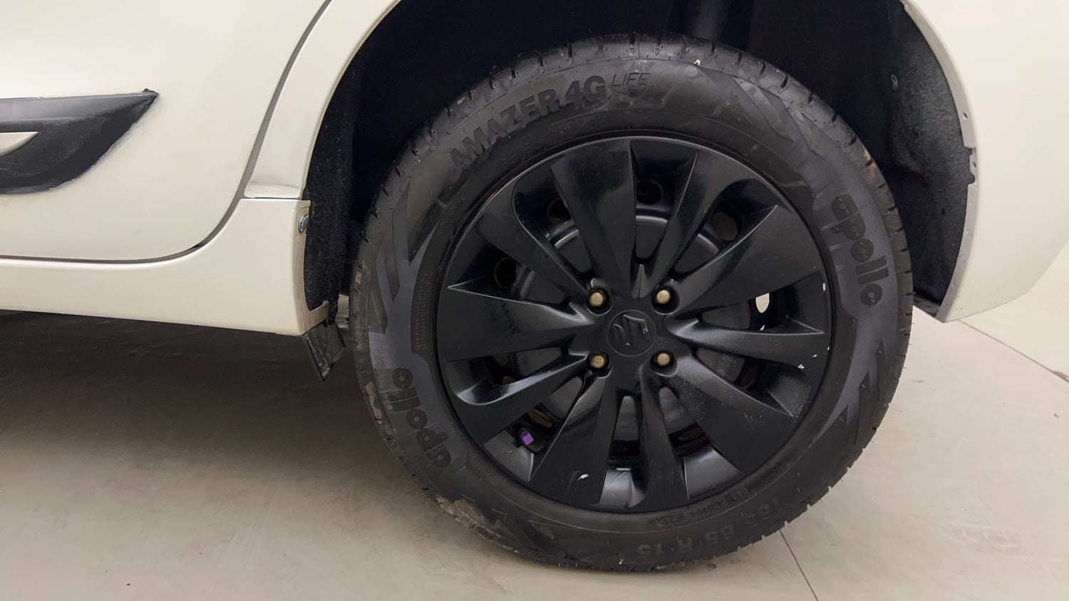 Used 2021 Maruti Suzuki Baleno Delta Petrol Manual tyres LEFT REAR TYRE RIM VIEW