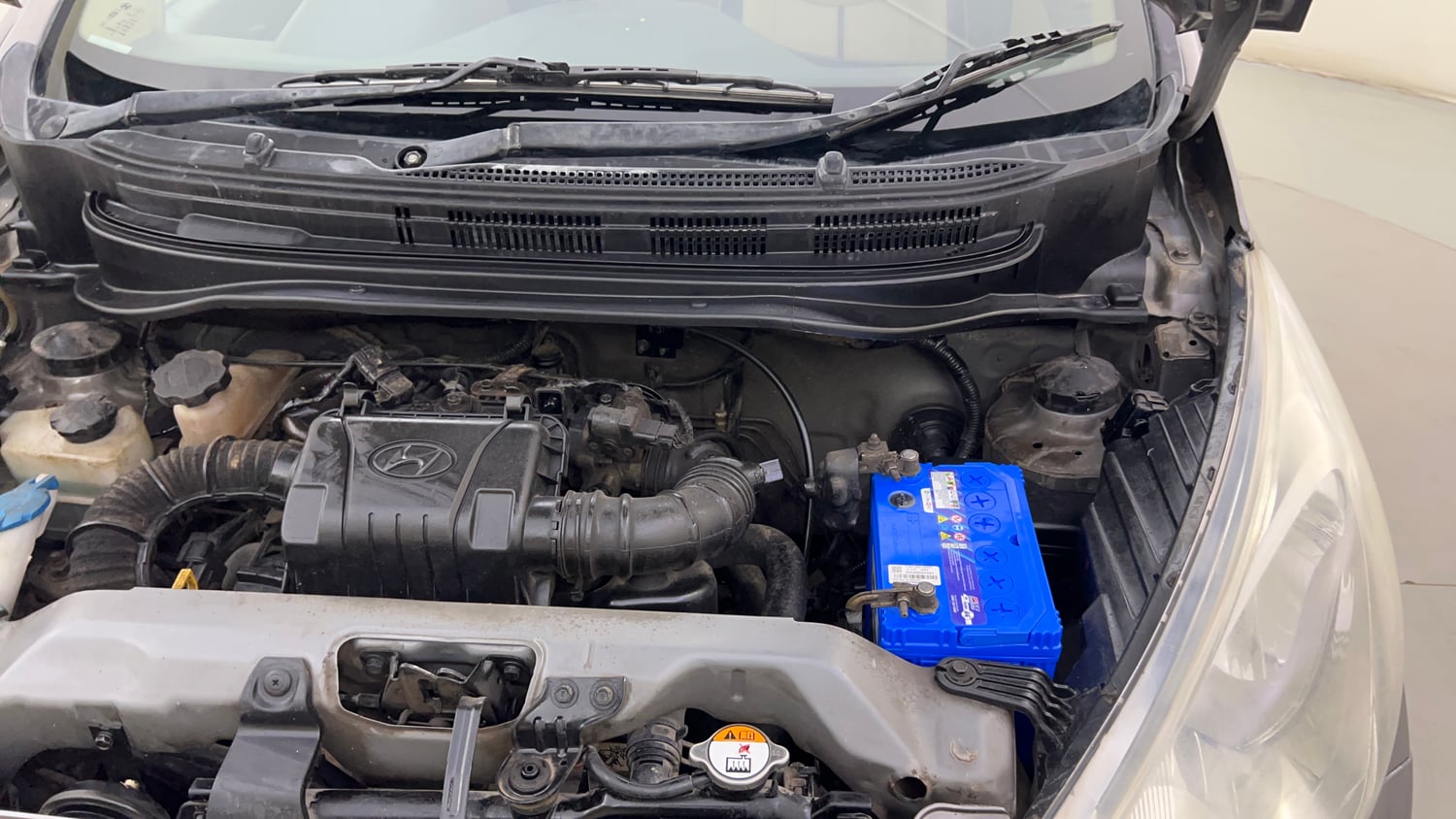 Used 2012 Hyundai Eon Magna + Petrol Manual engine ENGINE LEFT SIDE HINGE & APRON VIEW