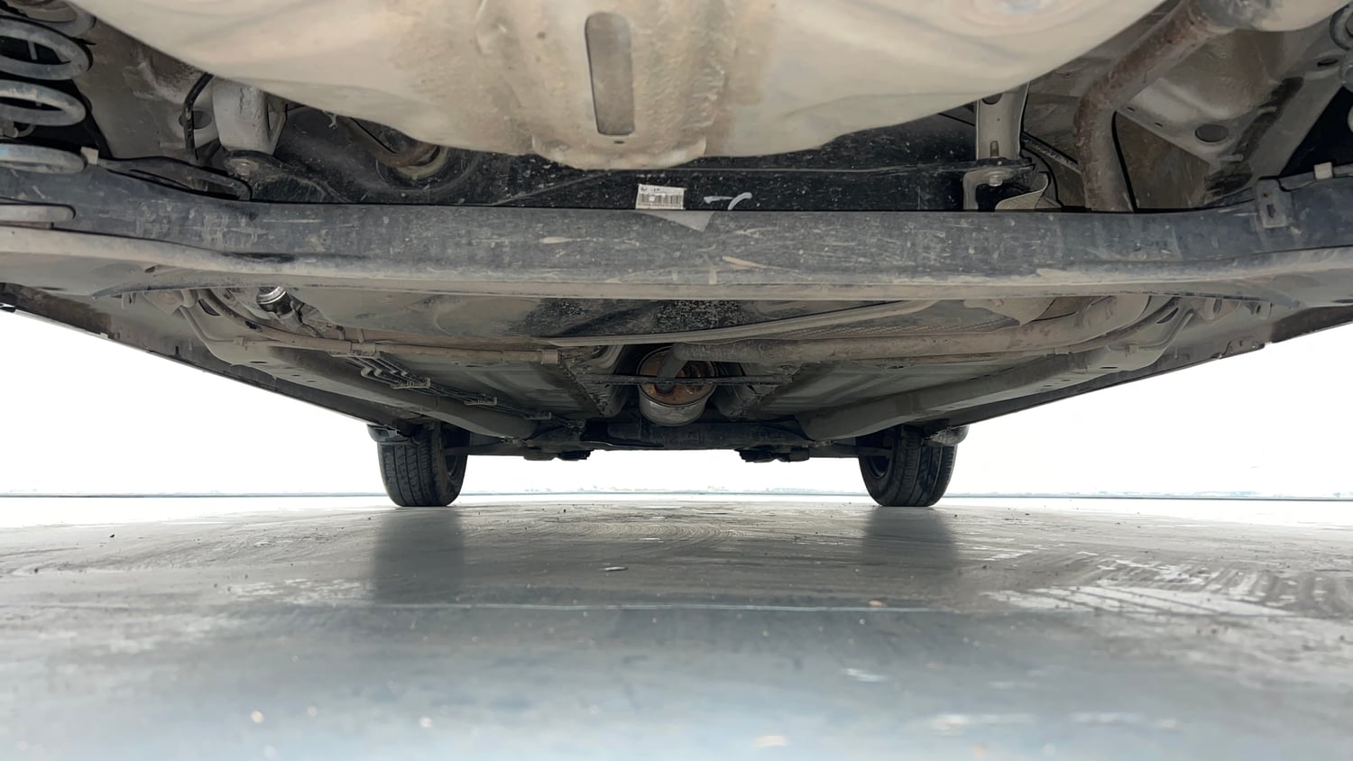 Used 2020 Maruti Suzuki Baleno Delta Petrol Manual extra REAR UNDERBODY VIEW (TAKEN FROM REAR)