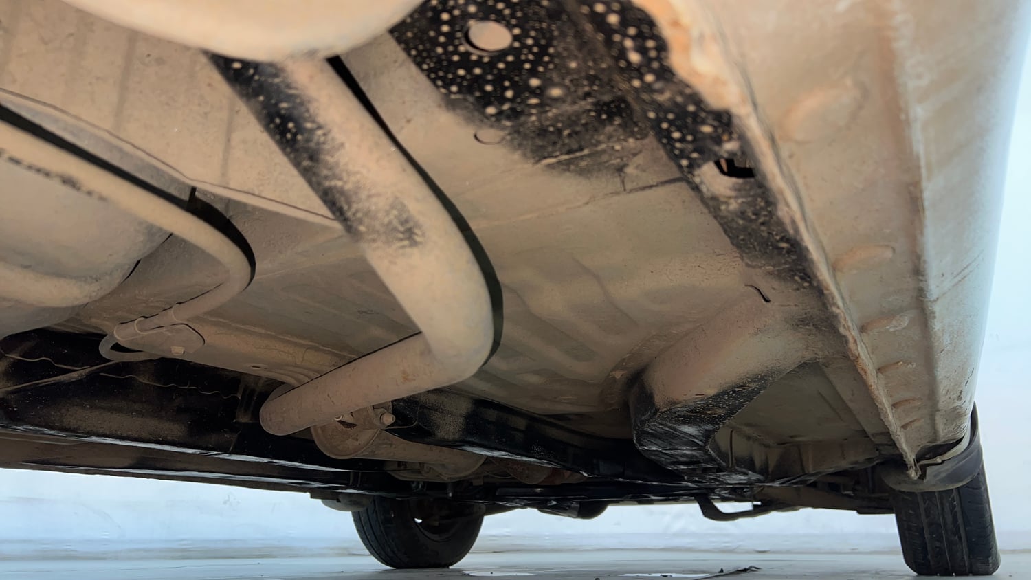 Used 2014 Honda Amaze 1.2 S i-VTEC Petrol Manual extra REAR RIGHT UNDERBODY VIEW