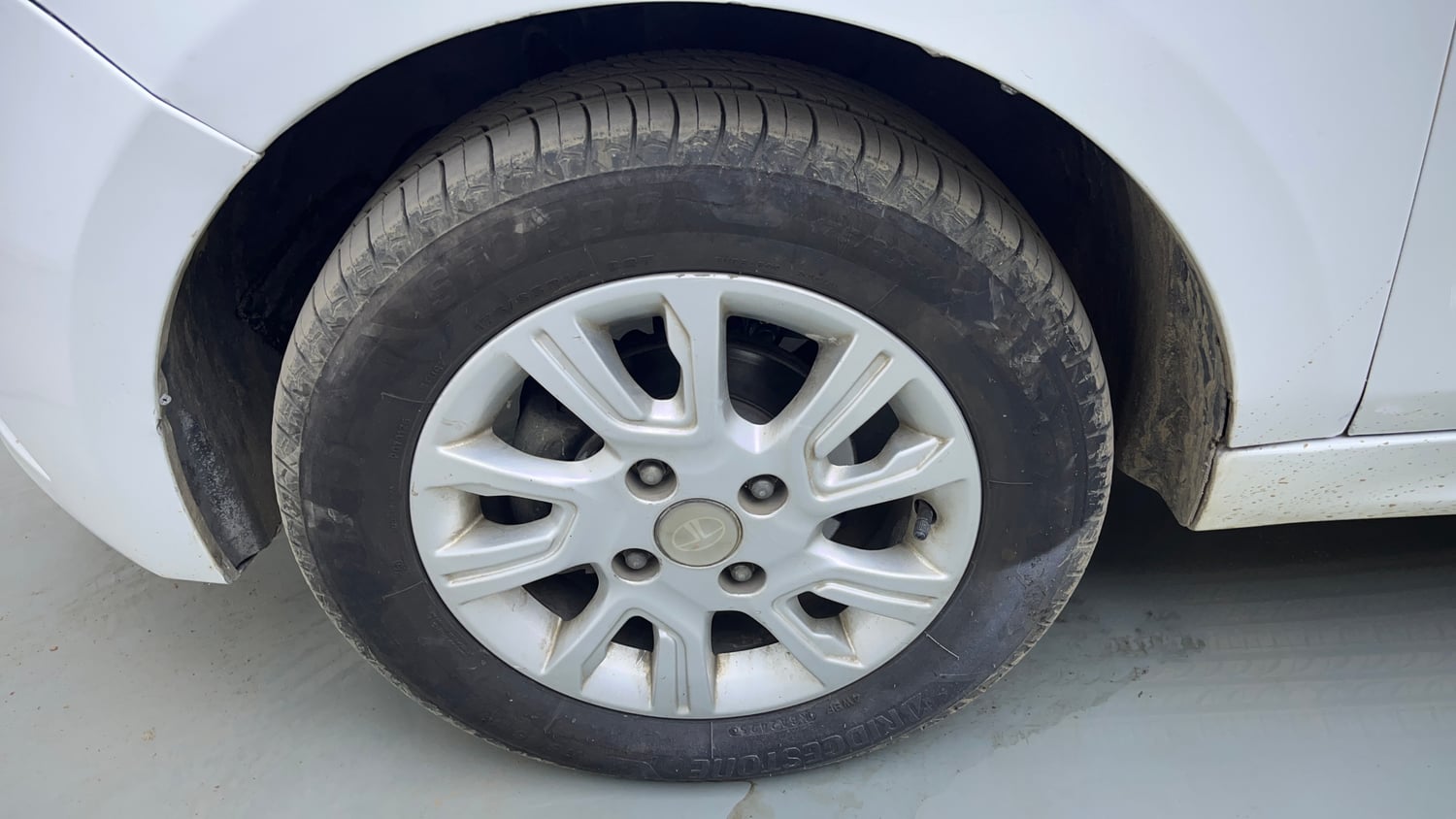 Used 2018 Tata Tiago Revotron XZ Petrol Manual tyres LEFT FRONT TYRE RIM VIEW