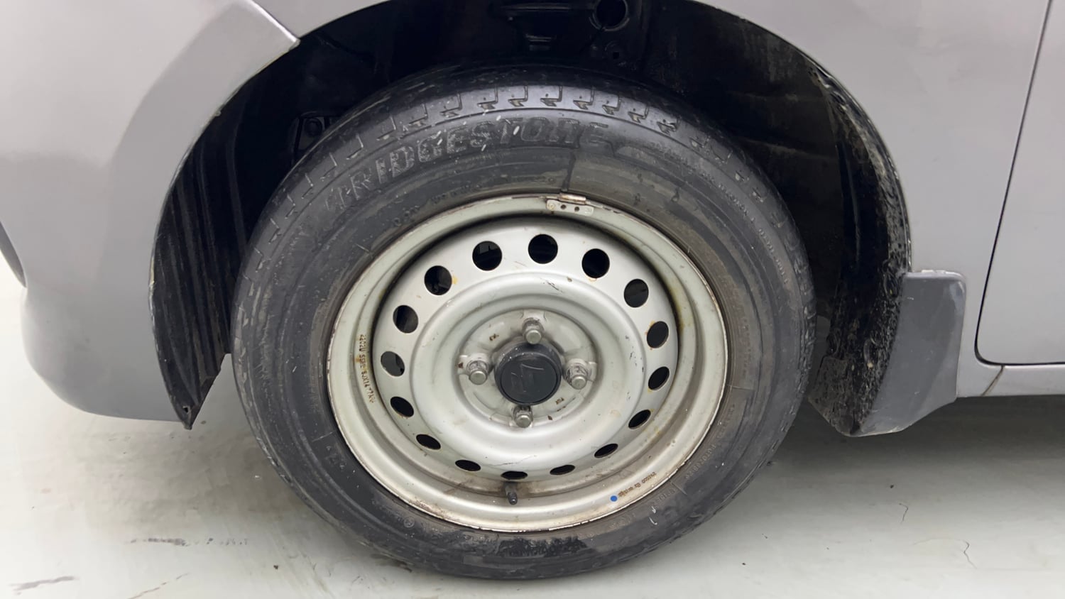 Used 2022 Maruti Suzuki Celerio LXi Petrol Manual tyres LEFT FRONT TYRE RIM VIEW