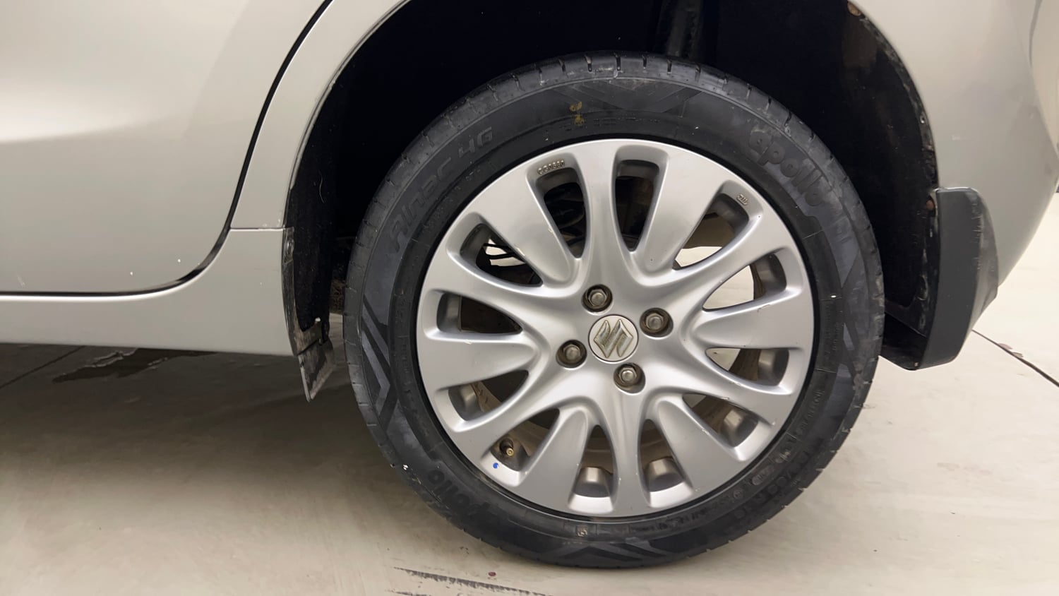 Used 2017 Maruti Suzuki Baleno Zeta 1.2 Petrol Manual tyres LEFT REAR TYRE RIM VIEW