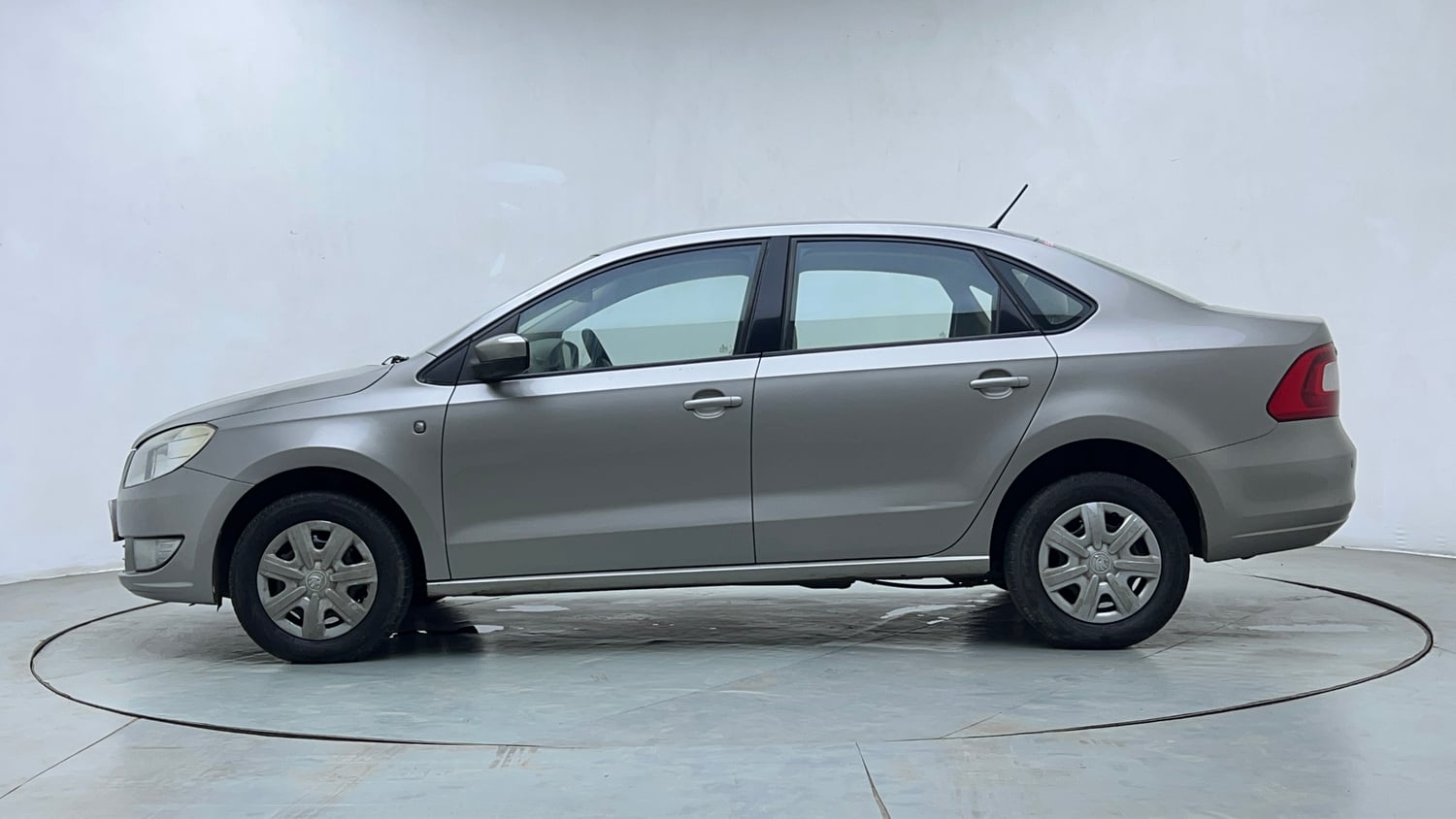 Used 2014 Skoda Rapid 1.6 MPI Ambition Plus Petrol Manual exterior LEFT SIDE VIEW