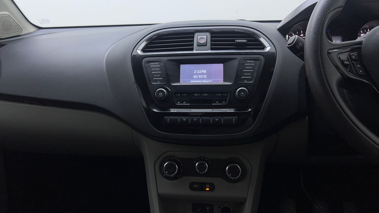 Used 2019 Tata Tiago Revotron XZ w/o Alloy Petrol Manual top_features Integrated (in-dash) music system