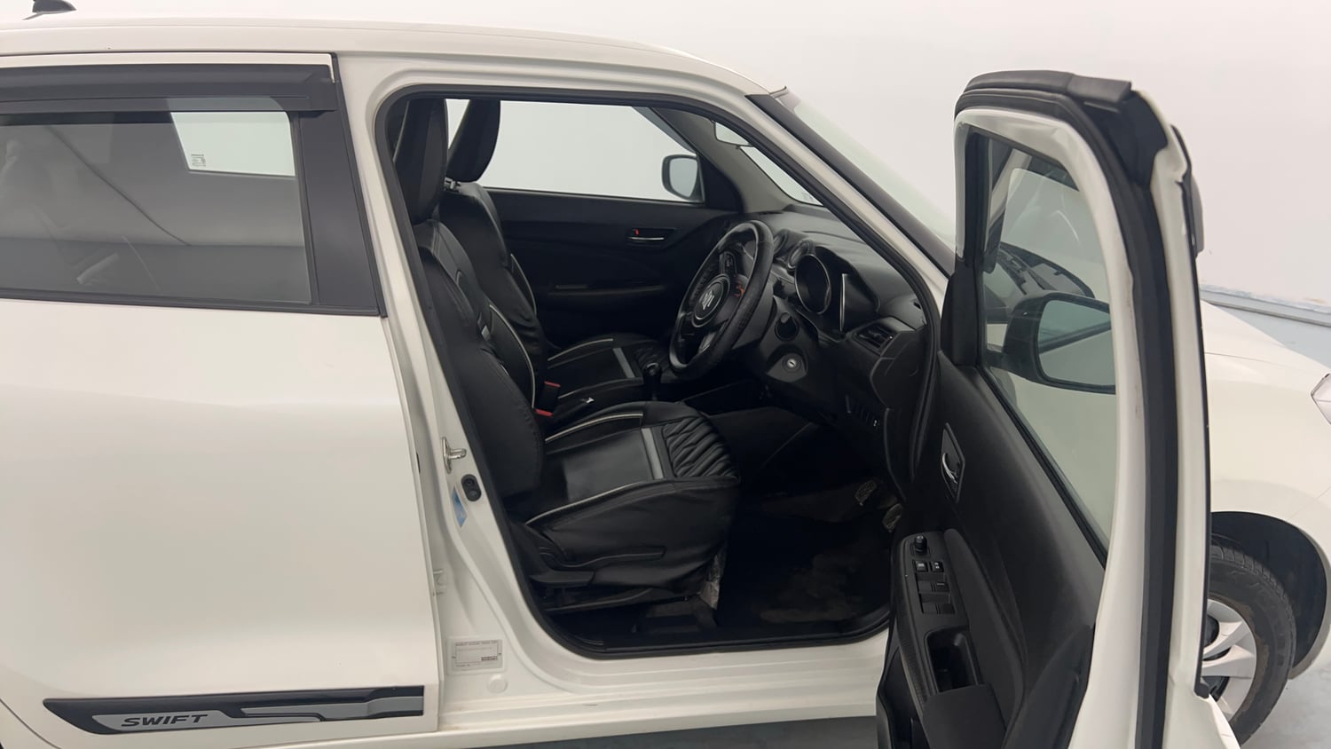Used 2023 Maruti Suzuki Swift VXi Petrol Manual interior RIGHT SIDE FRONT DOOR CABIN VIEW