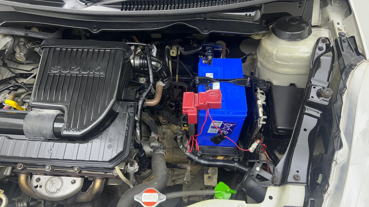 Used 2015 Maruti Suzuki Swift LXi Petrol Manual engine ENGINE LEFT SIDE VIEW