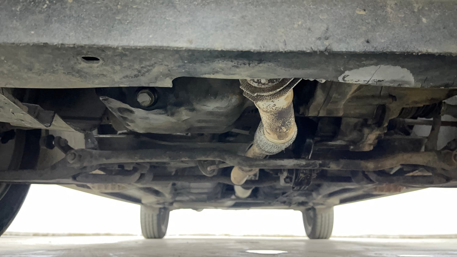 Used 2018 Tata Tiago Revotron XZ Petrol Manual extra FRONT LEFT UNDERBODY VIEW
