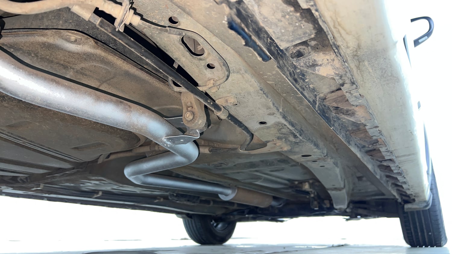 Used 2021 Maruti Suzuki XL6 Zeta AT Petrol Petrol Automatic extra REAR RIGHT UNDERBODY VIEW