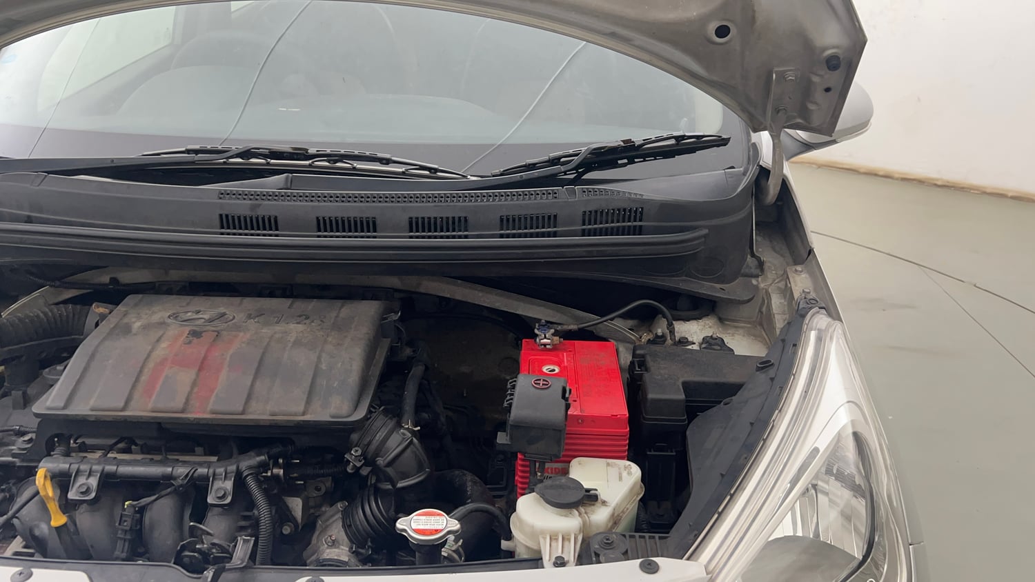 Used 2014 Hyundai Grand i10 Sportz 1.2 Kappa VTVT Petrol Manual engine ENGINE LEFT SIDE HINGE & APRON VIEW