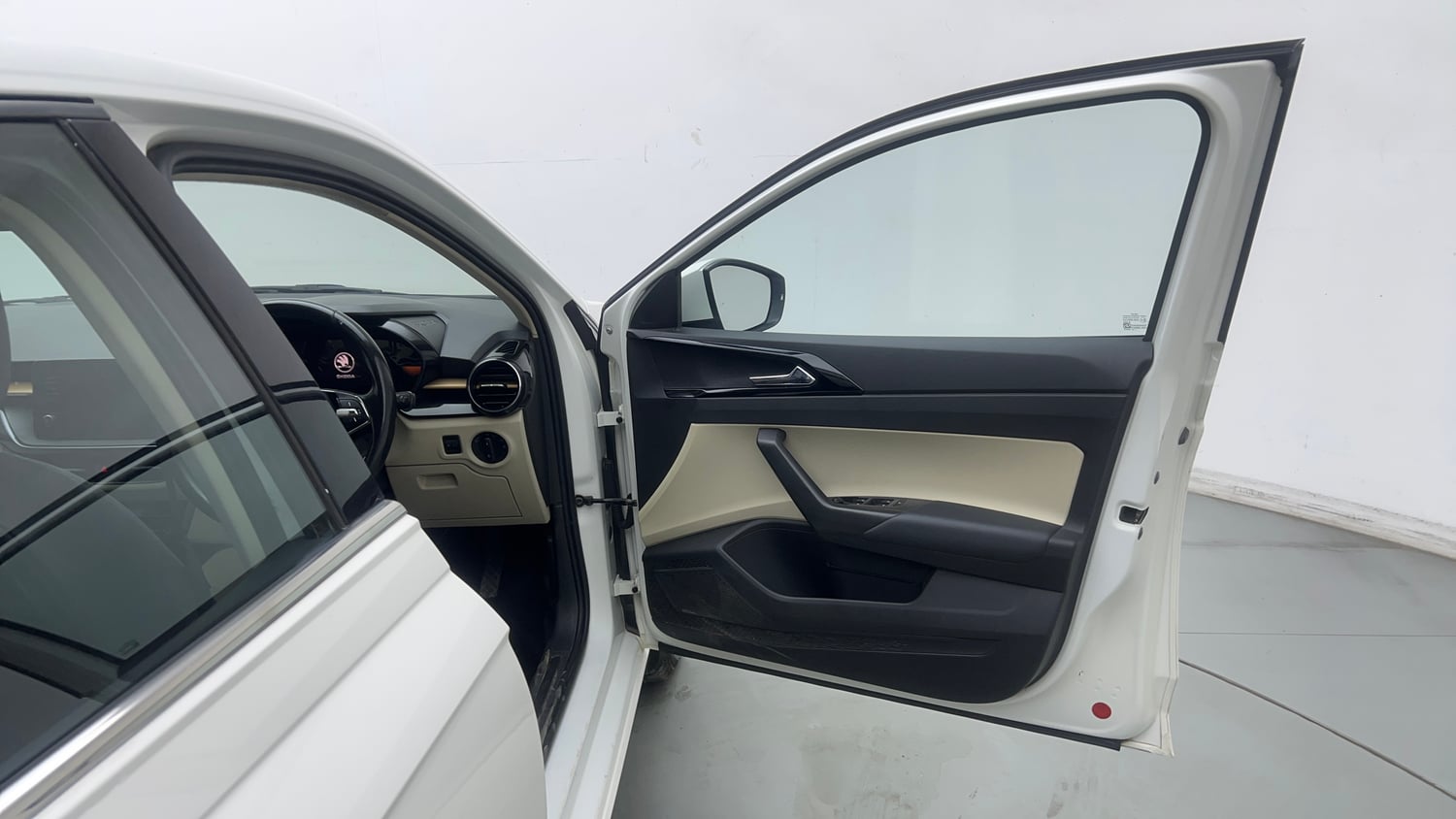 Used 2023 Skoda Slavia Style 1.0L TSI MT Petrol Manual interior RIGHT FRONT DOOR OPEN VIEW