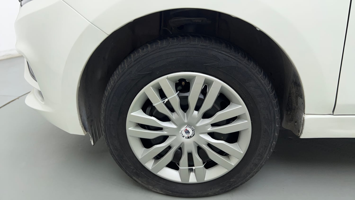Used 2022 Tata Tigor XZ CNG Cng Manual tyres LEFT FRONT TYRE RIM VIEW