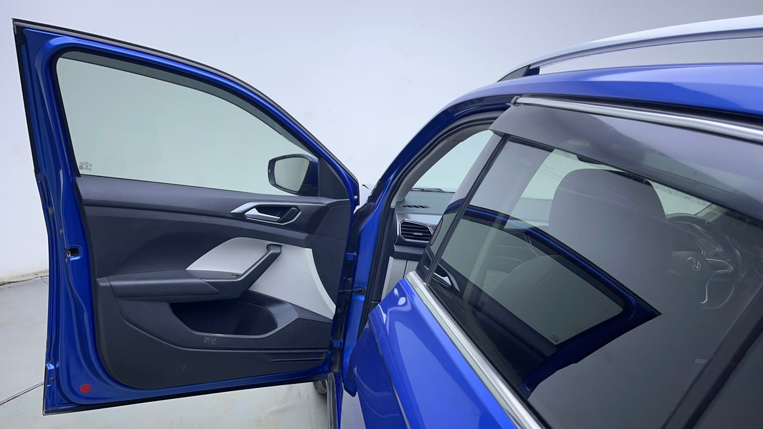 Used 2024 Volkswagen Taigun Topline 1.0 TSI AT Petrol Automatic interior LEFT FRONT DOOR OPEN VIEW