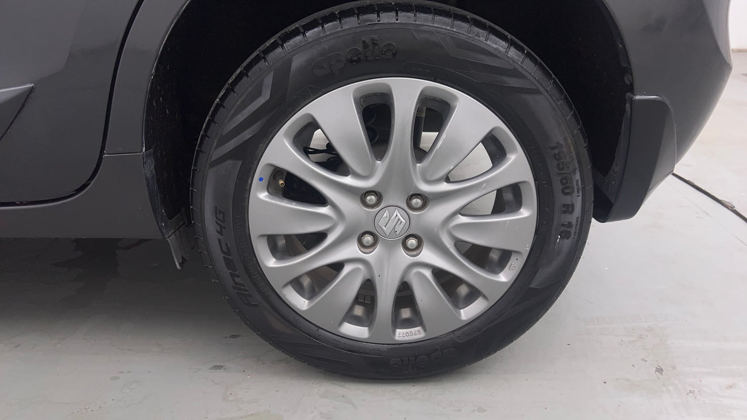 Used 2016 Maruti Suzuki Baleno Alpha 1.2 Petrol Manual tyres LEFT REAR TYRE RIM VIEW