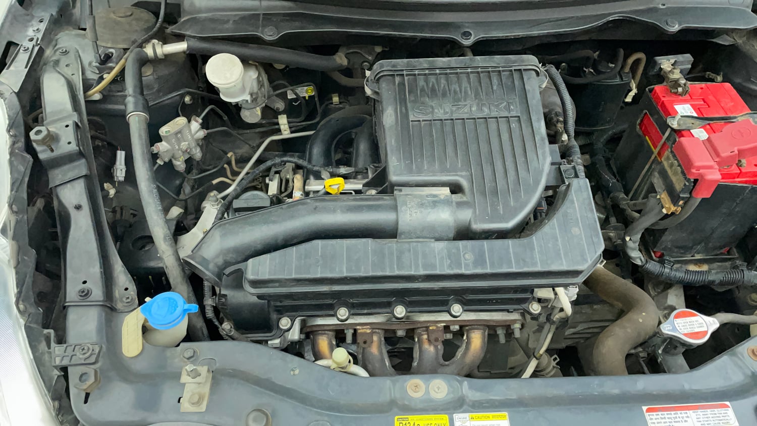 Used 2016 Maruti Suzuki Swift Lxi (O) Petrol Manual engine ENGINE RIGHT SIDE VIEW