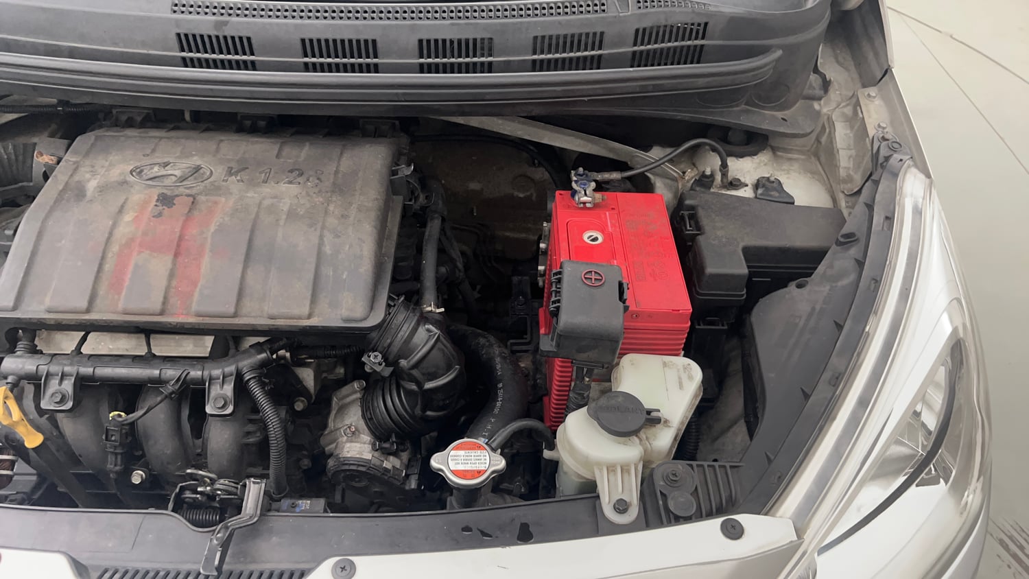 Used 2014 Hyundai Grand i10 Sportz 1.2 Kappa VTVT Petrol Manual engine ENGINE LEFT SIDE VIEW