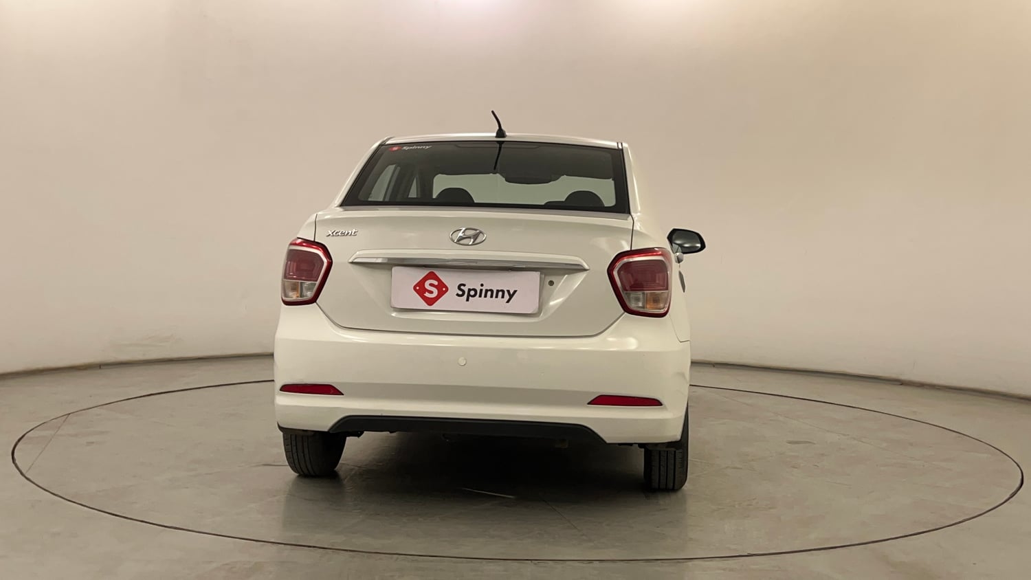 Used 2015 Hyundai Xcent Base 1.2 Petrol Manual exterior BACK VIEW